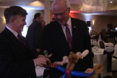 Peter Mansbridge (Performing close-up magic. Peter: "That was very impressive!")