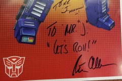 Transformers (Autographed Optimus Prime poster by voice actor Peter Cullen)